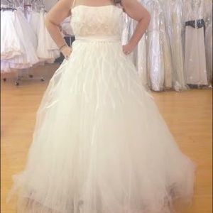 Never worn or altered wedding dress.